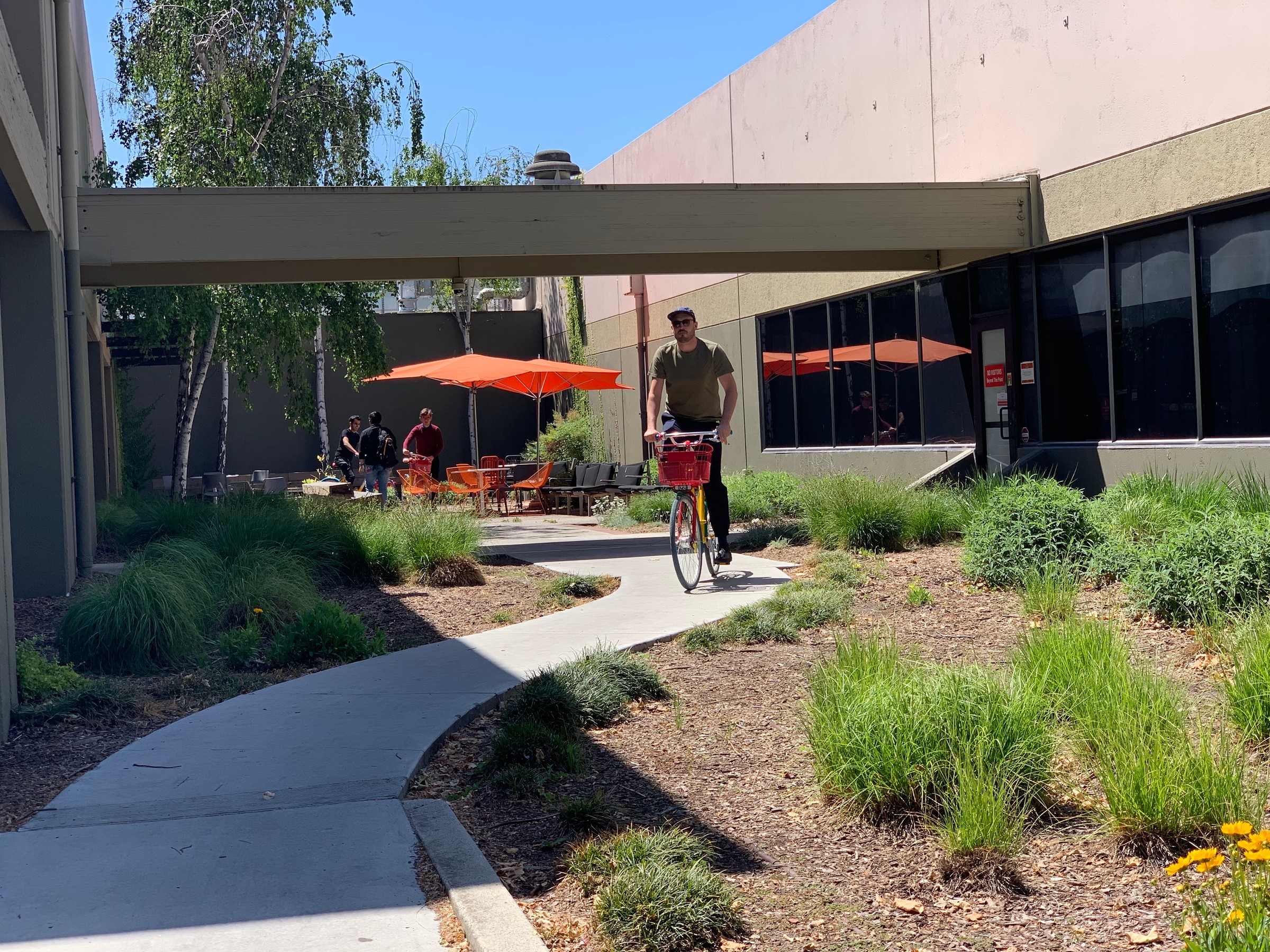 Martín riding a Google bike in Mountain View